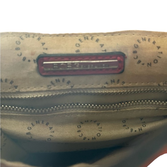 BCBG Enervation Burgundy Grommet Crossbody Backpack Purse Convertible Bag Boho